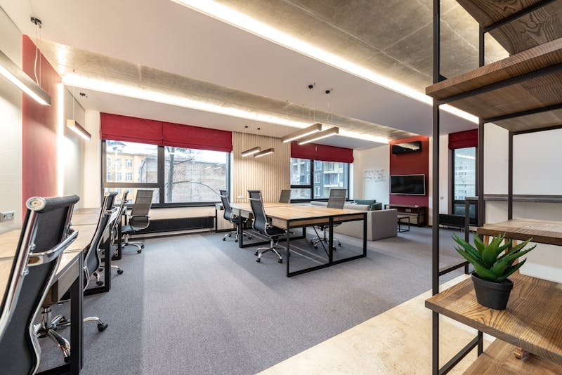 Modern office space with desks and chairs — Commercial cleaning service